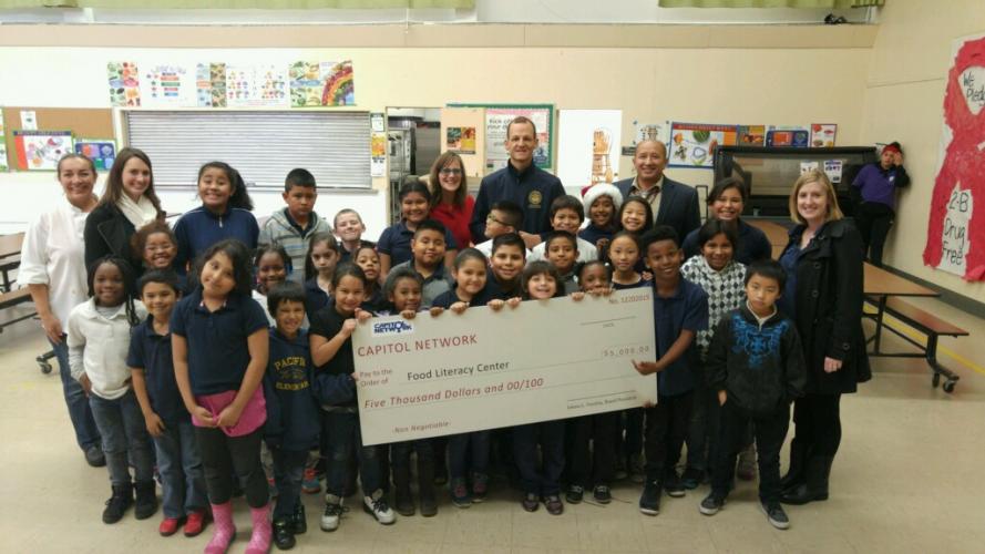 Capitol Network makes donation to the Food Literacy Center at Pacific Elementary's Masters Program. Thank you Capitol Network and Assemblymember Kevin McCarty. 